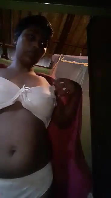 Cute village girl wearing clothes in front of cam