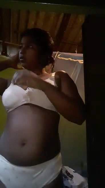 Cute village girl wearing clothes in front of cam