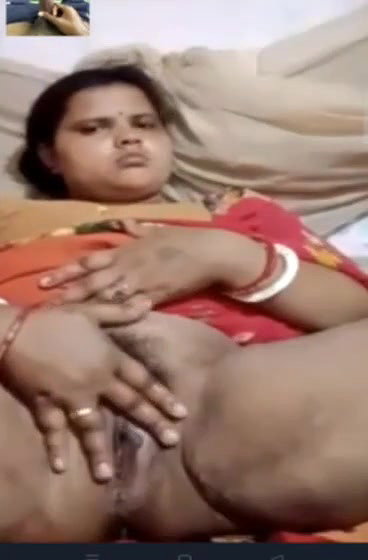 Unsatisfied village Bhabhi fingering her hairy pussy on video call