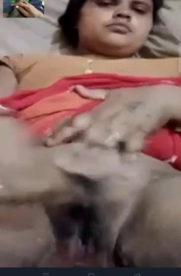 Unsatisfied village Bhabhi fingering her hairy pussy on video call