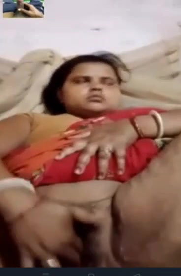 Unsatisfied village Bhabhi fingering her hairy pussy on video call