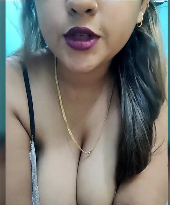 Natasha pressing her boobs show