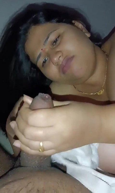 smiling sexy housewife giving blowjob