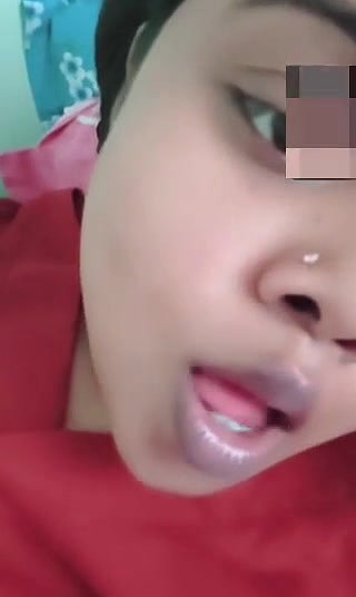 Indian girl pressing her boobs