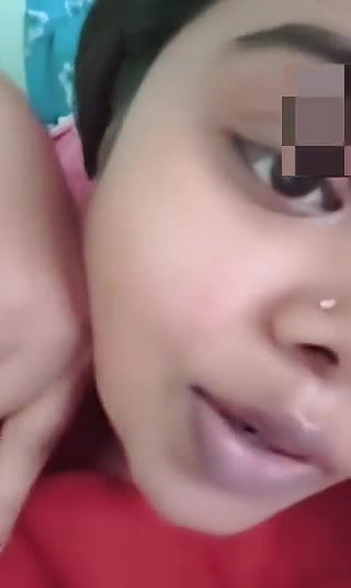 Indian girl pressing her boobs