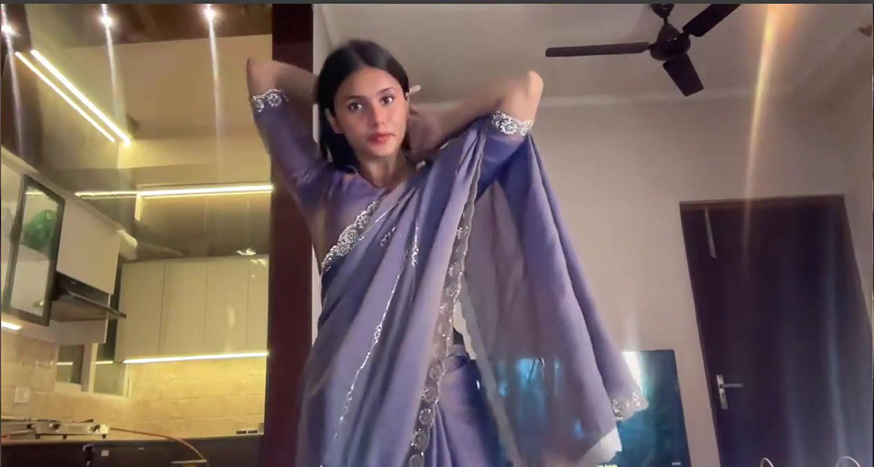 Fit young girl naked in saree and dance