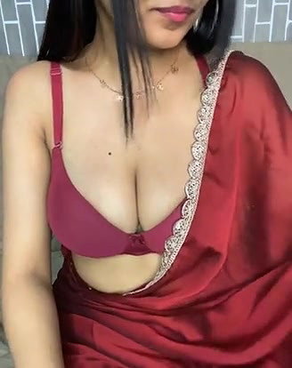 Hot girl in red color saree showing her beauty boobs