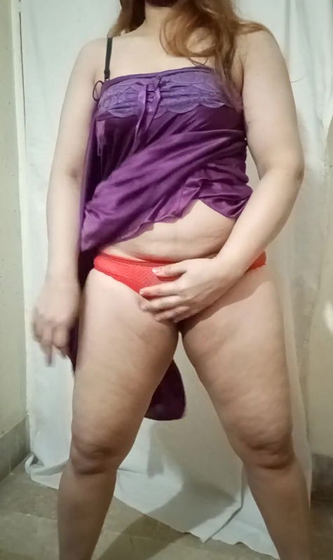 Pakistani wife is playing with her milky body in a pink nightie and removing her clothes and showing her panty and bra a