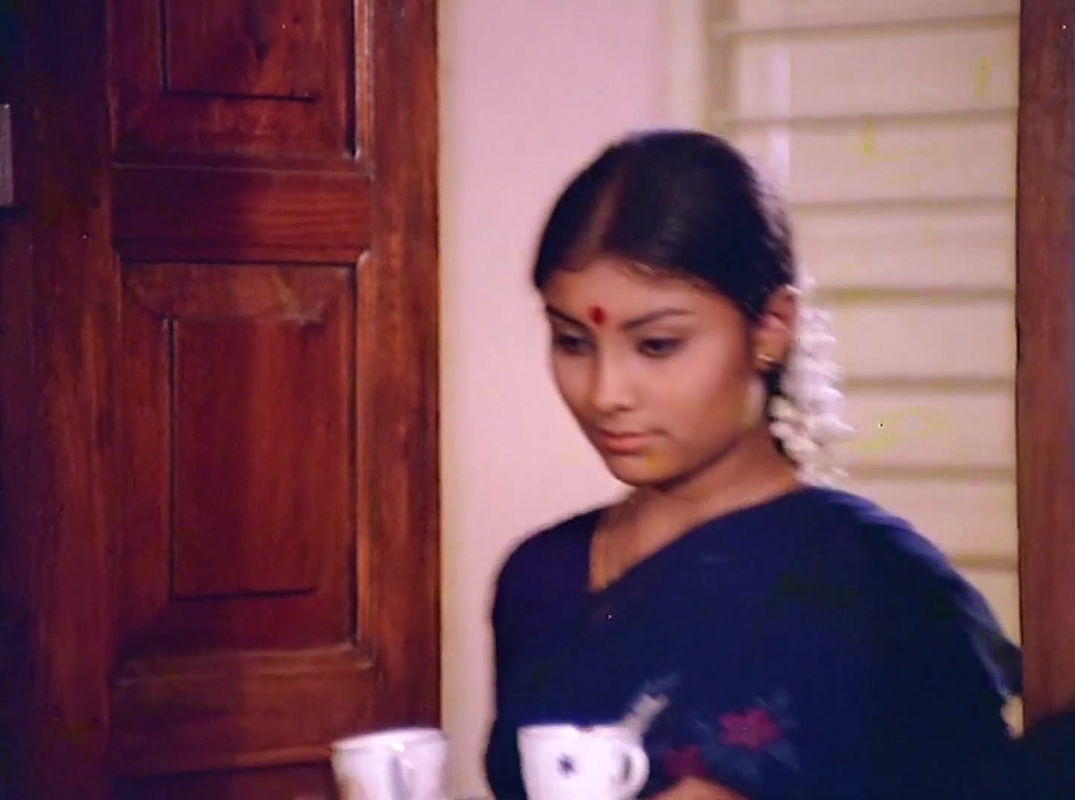 Beautiful Poornima and white bra