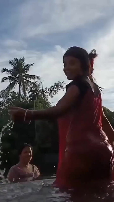 Hot Girl Playing in Pond