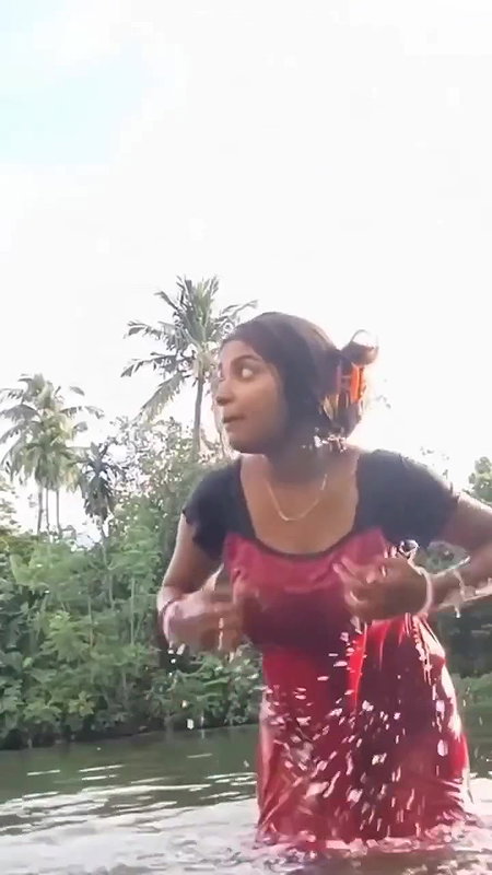 Hot Girl Playing in Pond