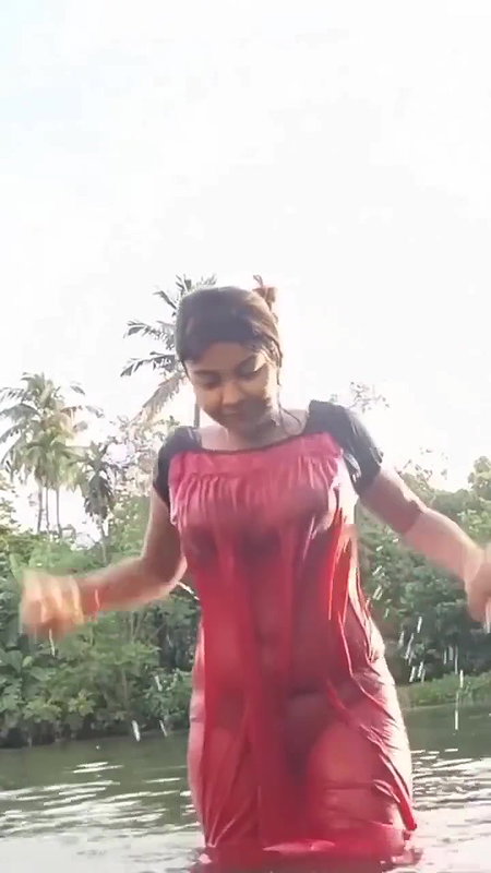 Hot Girl Playing in Pond