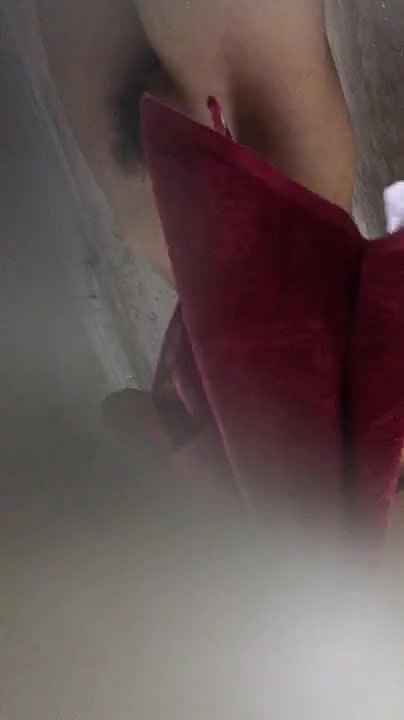 Naked Bathing babe captured by spycam – Nude Boobs and hairy Pussy visible