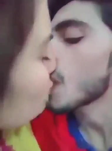 Cute Indian Couple Kissing