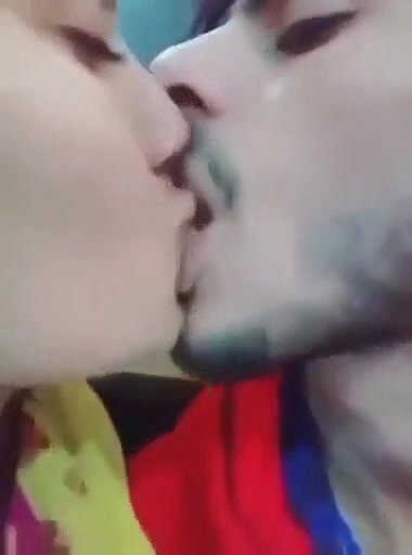 Cute Indian Couple Kissing