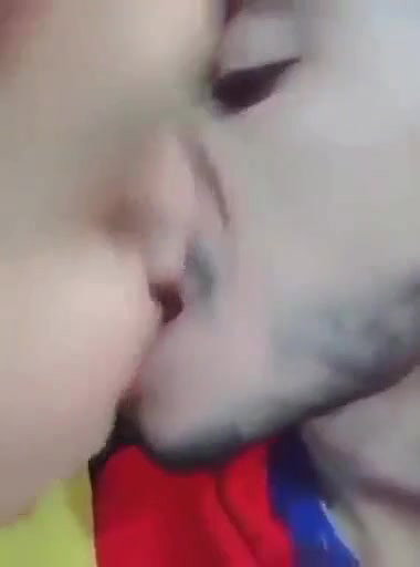 Cute Indian Couple Kissing
