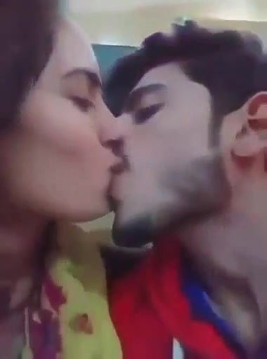 Cute Indian Couple Kissing