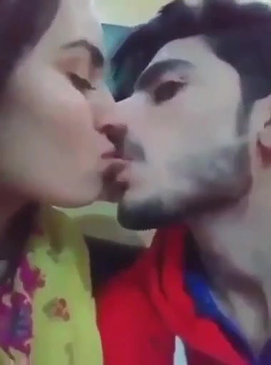 Cute Indian Couple Kissing