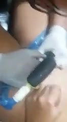 Cute chubby girl having tattoo on pussy