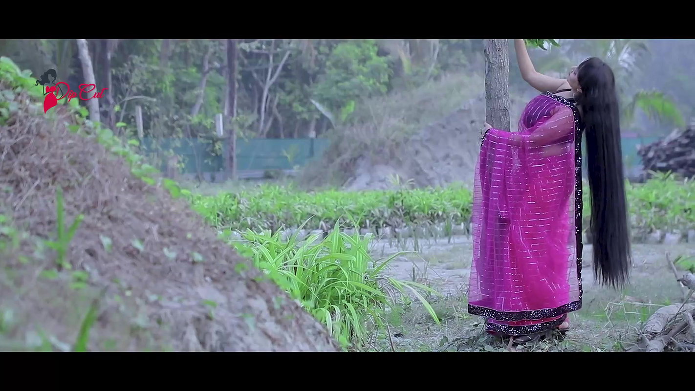 Varsha Flaunting Sexy Armpits & Deep Navel in Pink Net Saree