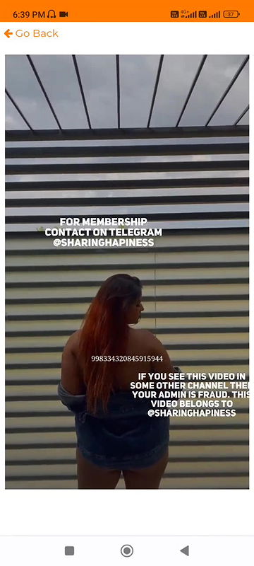 Naasha stripping her shirt