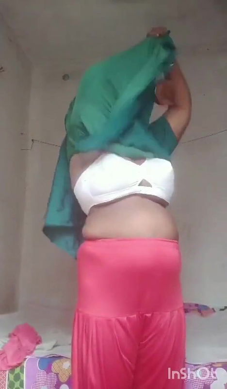 Indian lady bedroom dress change performance