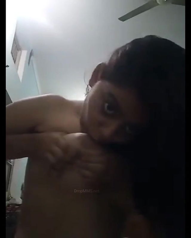 Desi Teen squeezing her own boobs