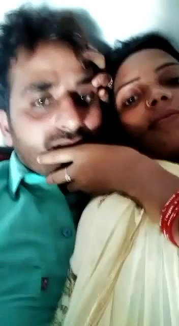 Village couple kiss