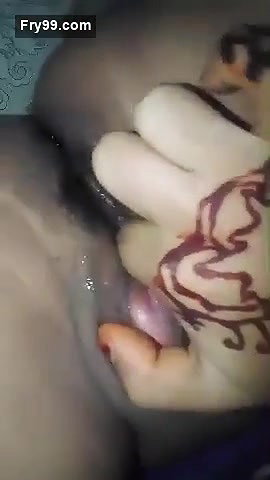 Rubbing her wet pussy