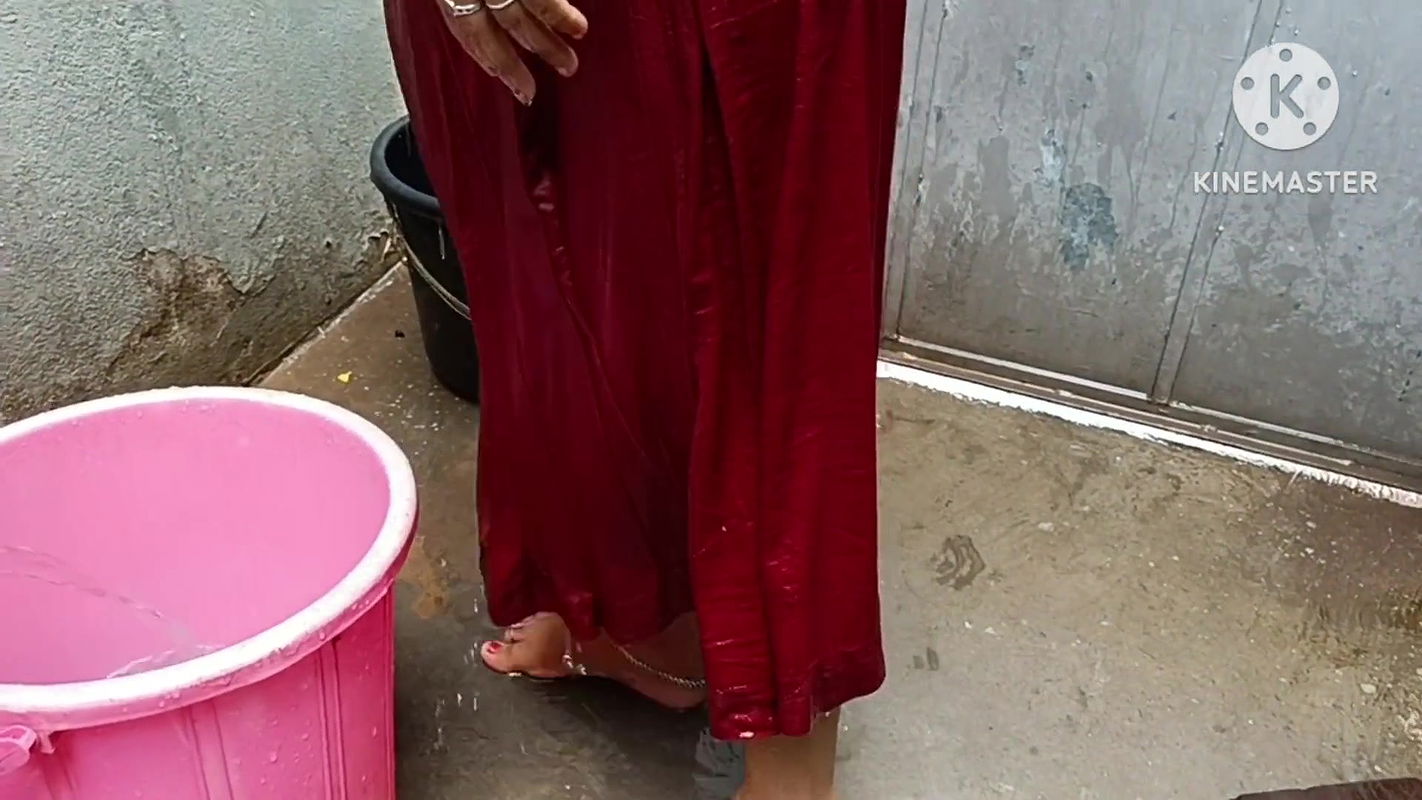Indian Wife Bathing Outside