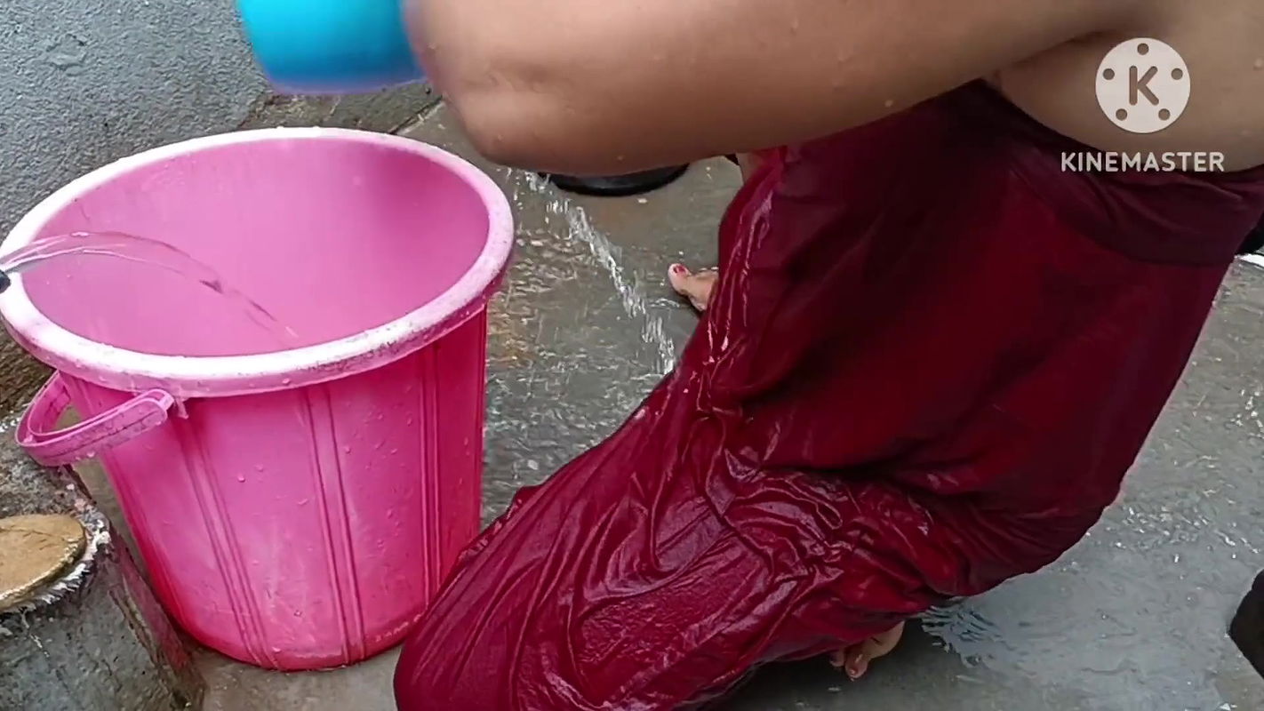 Indian Wife Bathing Outside