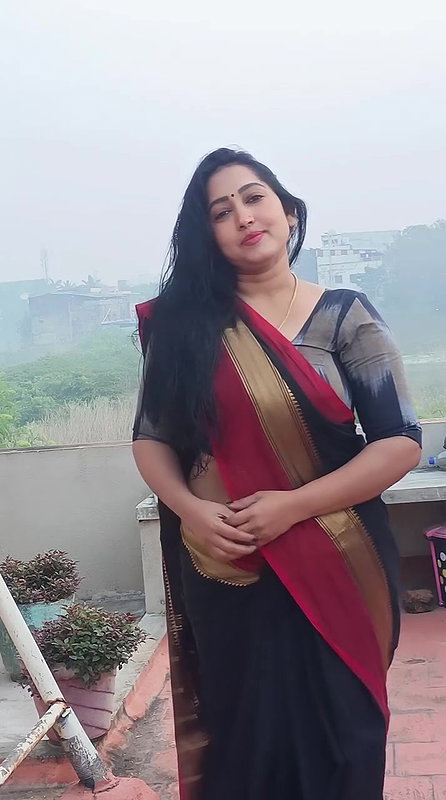 harsha tempting curvers and tummy in black saree 22