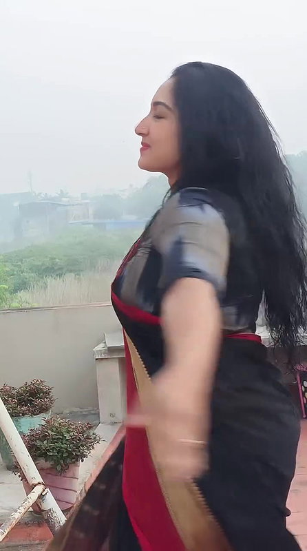 harsha tempting curvers and tummy in black saree 22