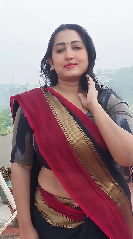 harsha tempting curvers and tummy in black saree 22