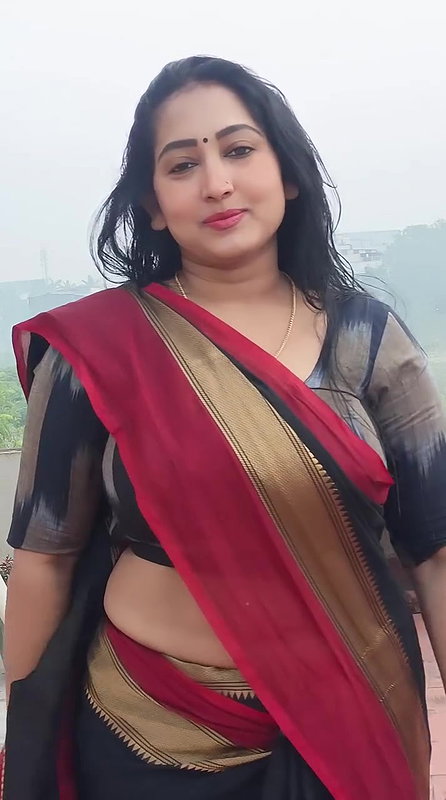 harsha tempting curvers and tummy in black saree 22