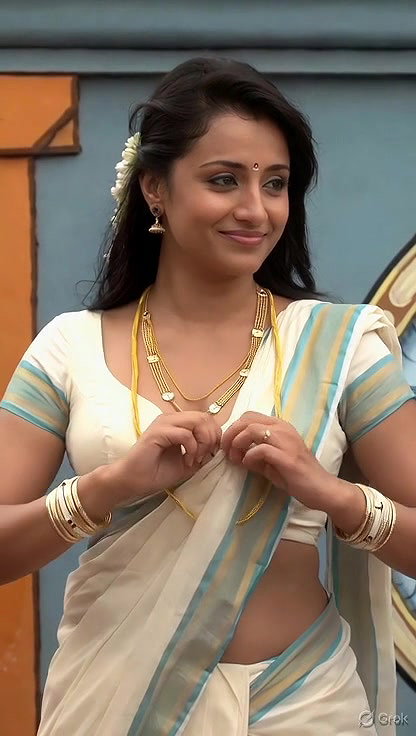Trisha adjusting saree wantedly to reveal and tempt 25