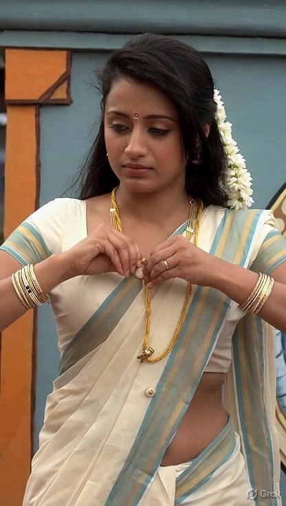 Trisha adjusting saree wantedly to reveal and tempt 211