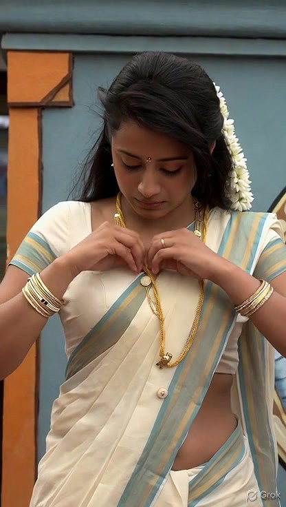 Trisha adjusting saree wantedly to reveal and tempt 211