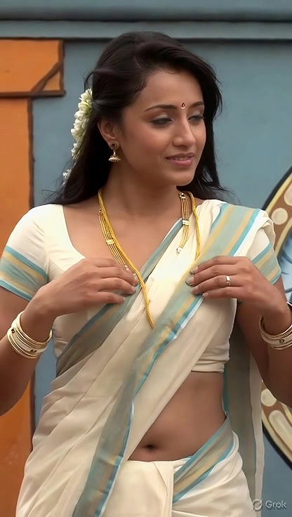 Trisha adjusting saree wantedly to reveal and tempt 259
