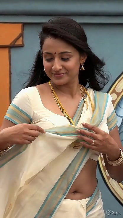 Trisha adjusting saree wantedly to reveal and tempt 268