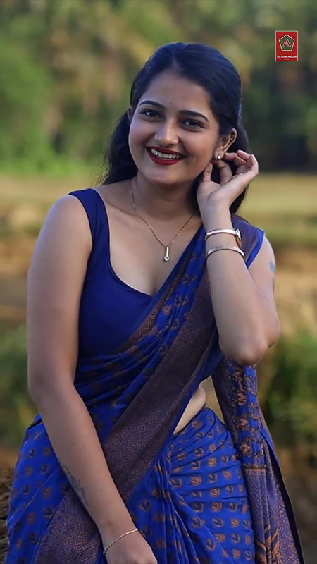 cute sexy malayali girl cleavage and navel in violet saree 22