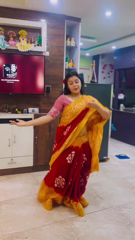 Moksha Sexy Wide Navel show in orange saree 22