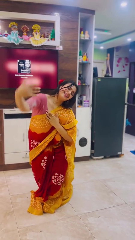 Moksha Sexy Wide Navel show in orange saree 22