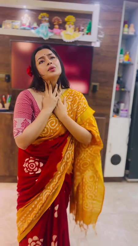 Moksha Sexy Wide Navel show in orange saree 22