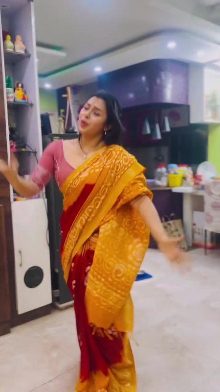 Moksha Sexy Wide Navel show in orange saree 22