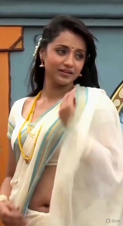 Trisha adjusting saree wantedly to reveal and tempt 24