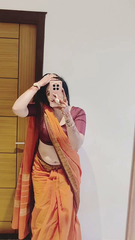 sexy mirror navel selfie lady in orange saree2