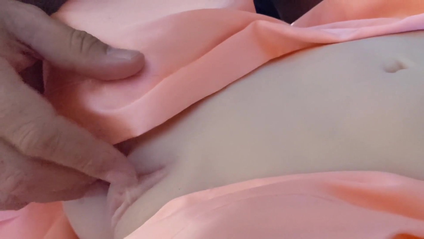 Submissive chick cannot stop licking that fake pussy in a hot threesome