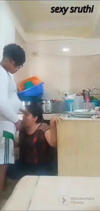 Giving blowjob to young devar in kitchen