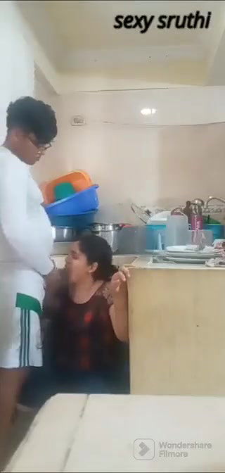 Giving blowjob to young devar in kitchen